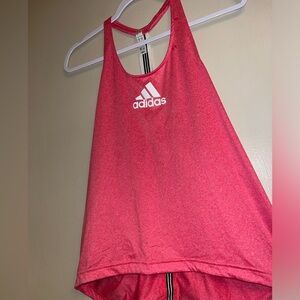 Cutest Red Adidas Tank love the black and white strip down the back.  Size M